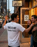 This Is My Outside Voice white funny statement shirt worn outside a comedy venue